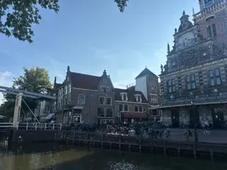 The Waag and a drawbridge seen across the canal in Alkmaar