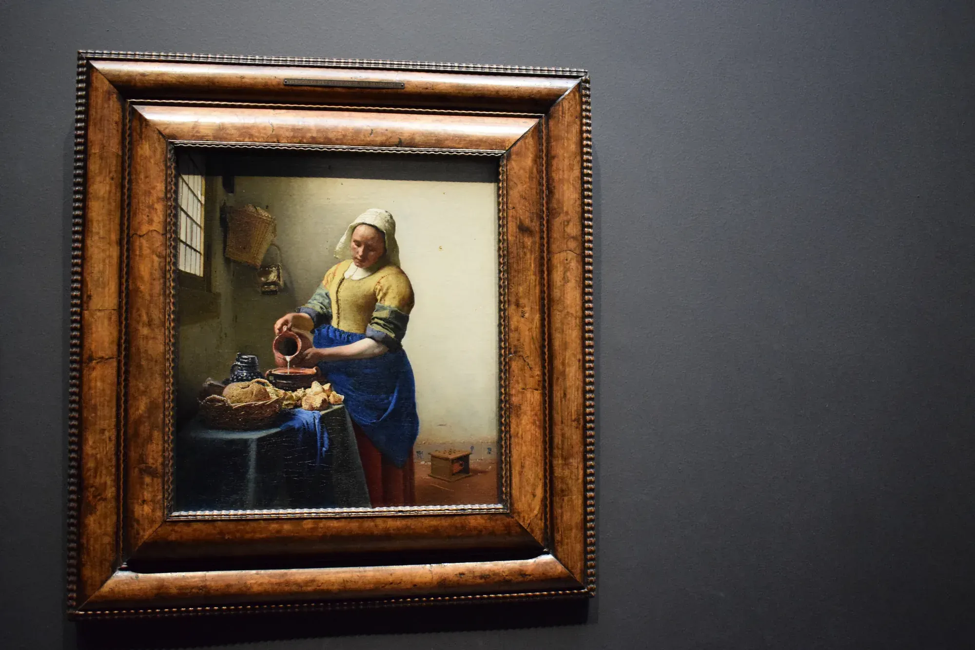 Vermeer's The Milkmaid on display at the Rijksmuseum, Amsterdam