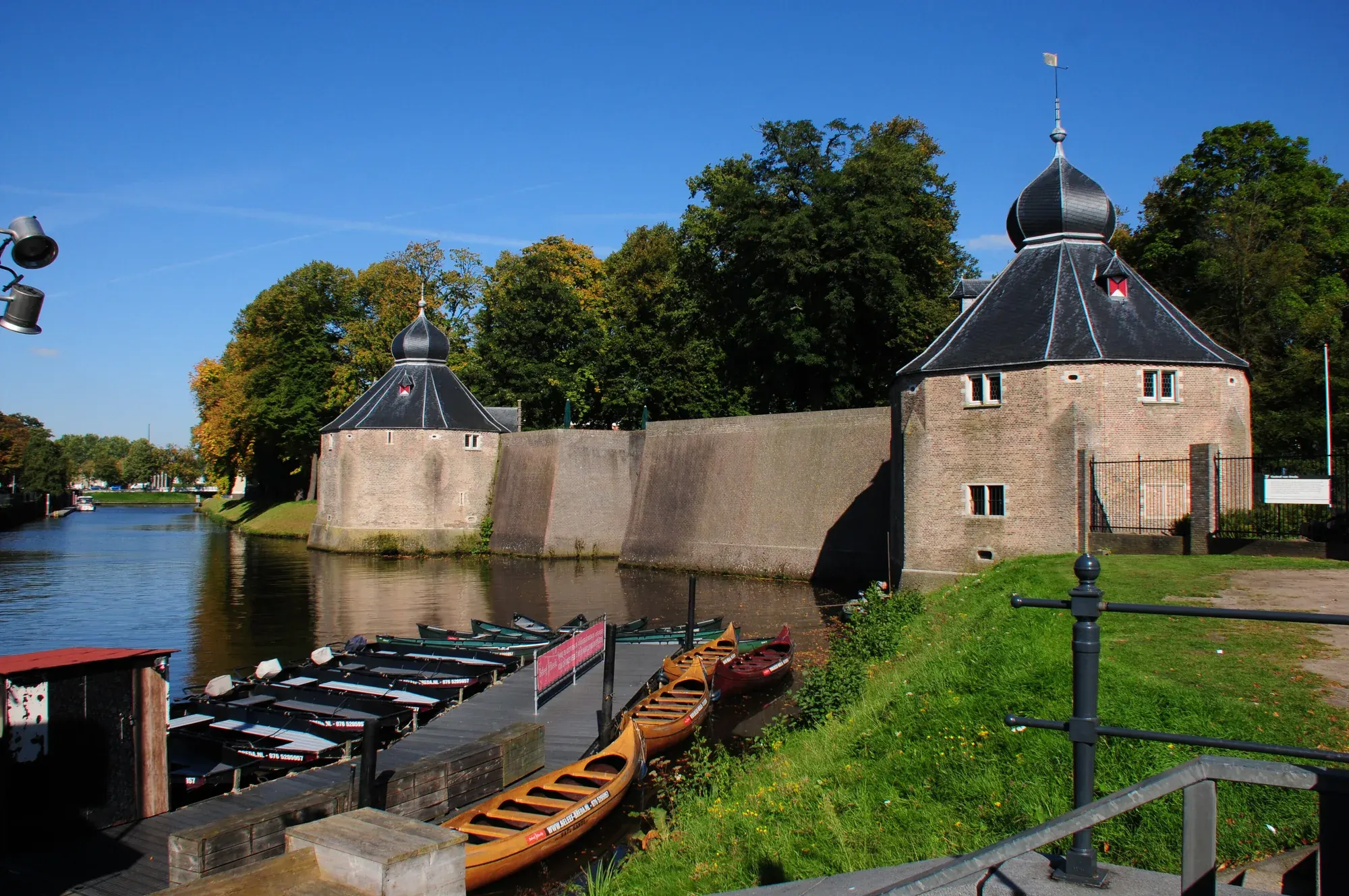The castle moat at the Spanjaardsgat in Breda with rowing boats moored along the bank