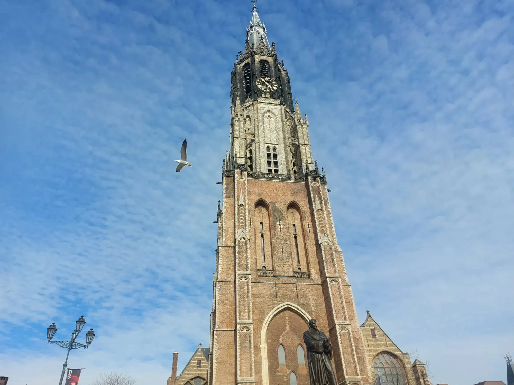 Close-up of the Nieuwe Kerk tower and clock, Delft