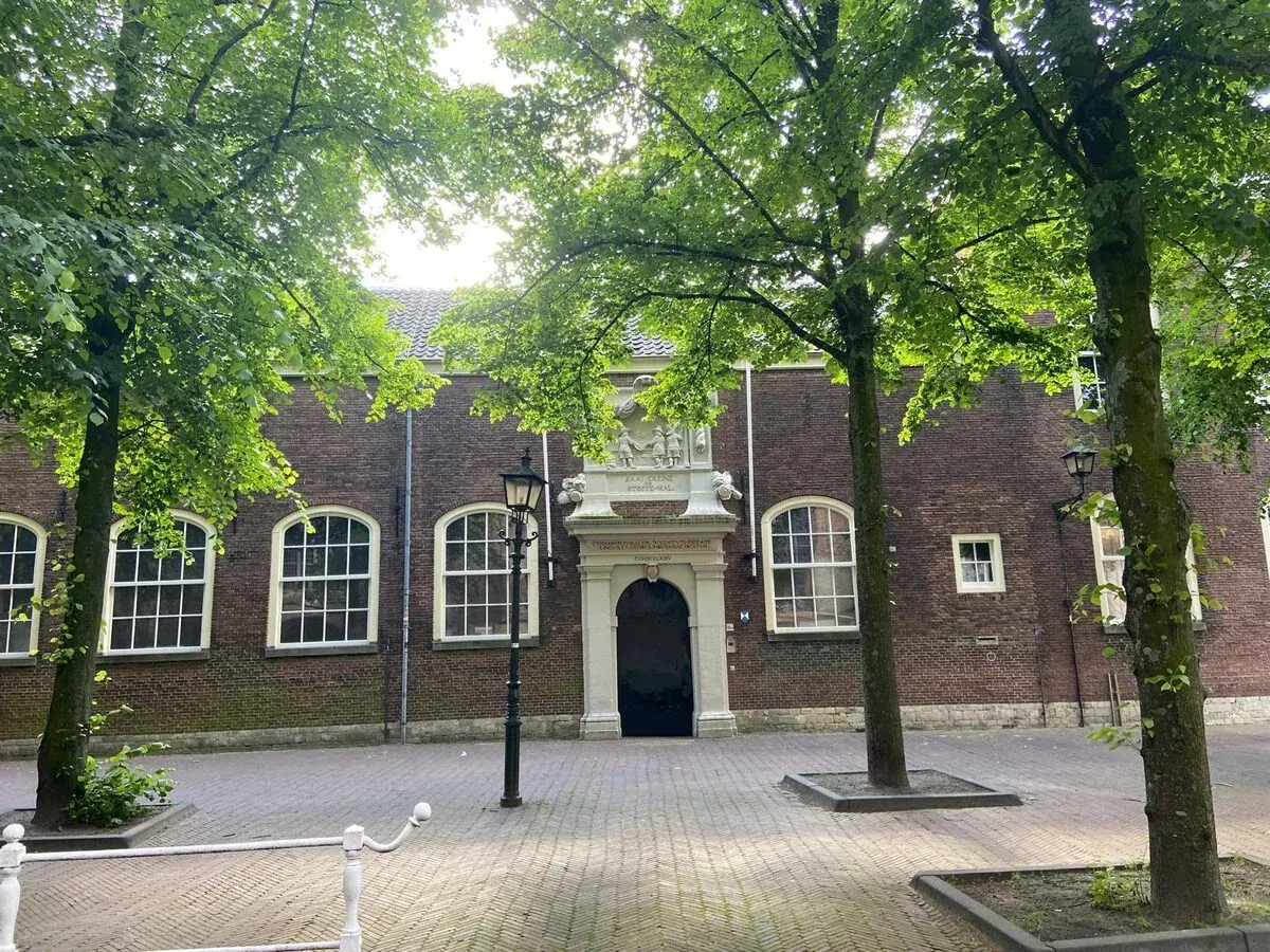 The canal-side facade of the Prinsenhof in Delft
