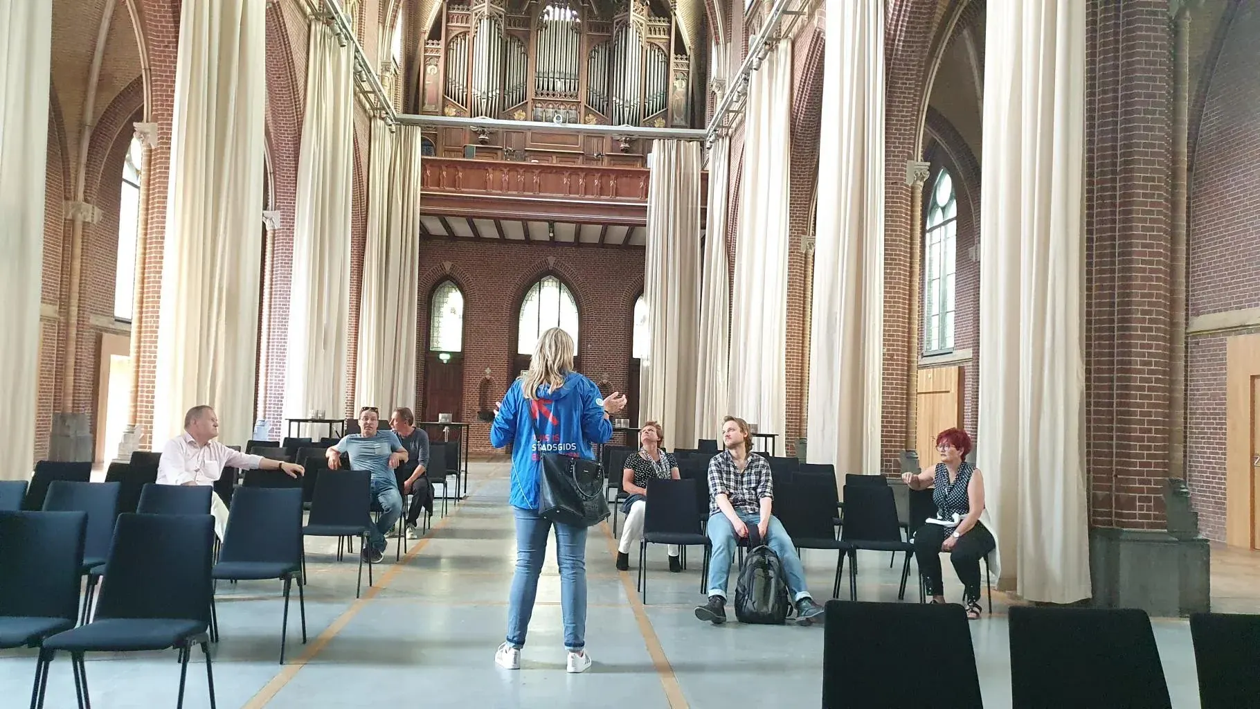 The columned interior of a church converted into a public venue, Eindhoven