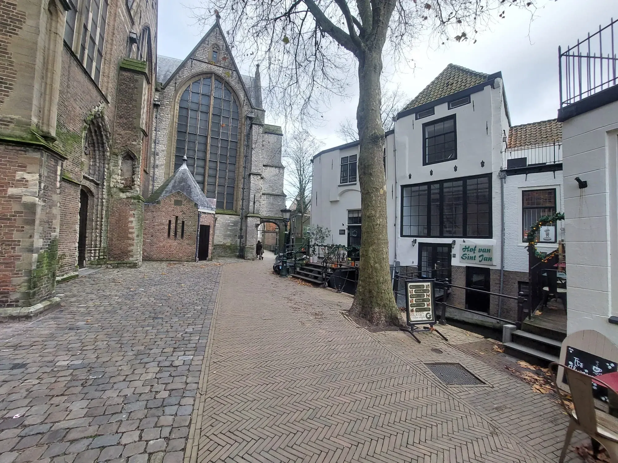Cobbled courtyard beside the Sint-Janskerk, the longest church in the Netherlands, Gouda