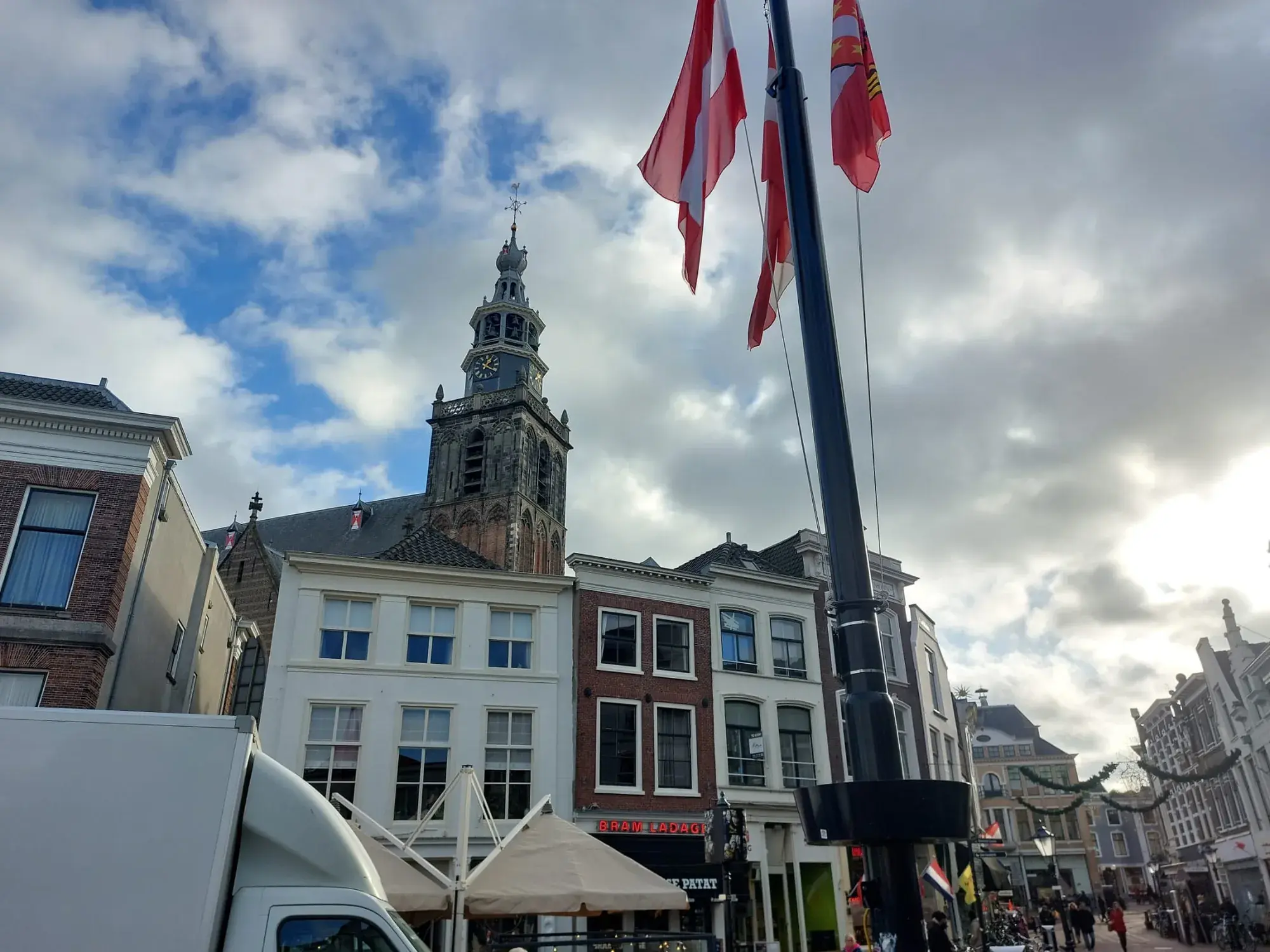 The tower of the Sint-Janskerk seen from a street near the Markt, Gouda