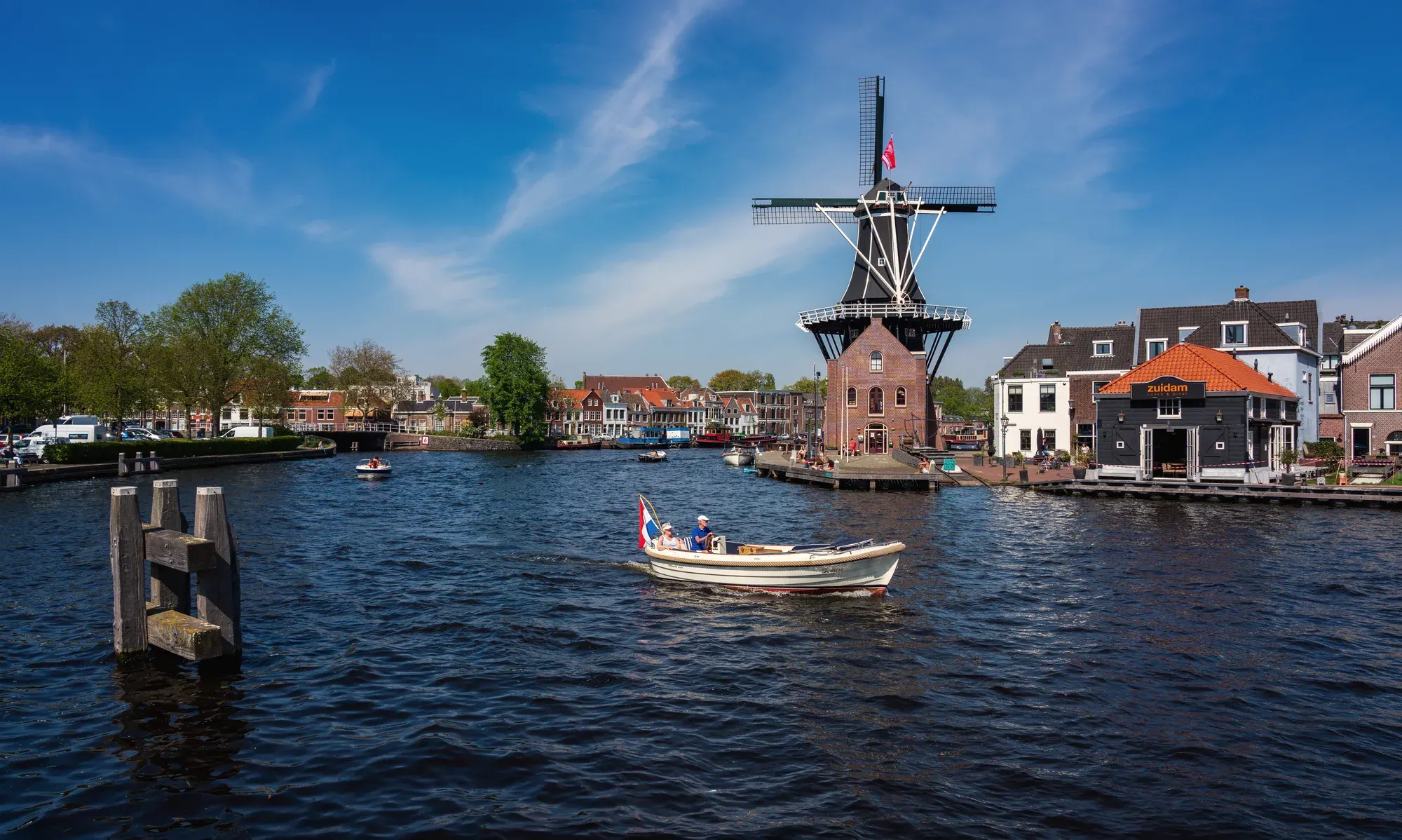 The Molen de Adriaan windmill across the river Spaarne, Haarlem