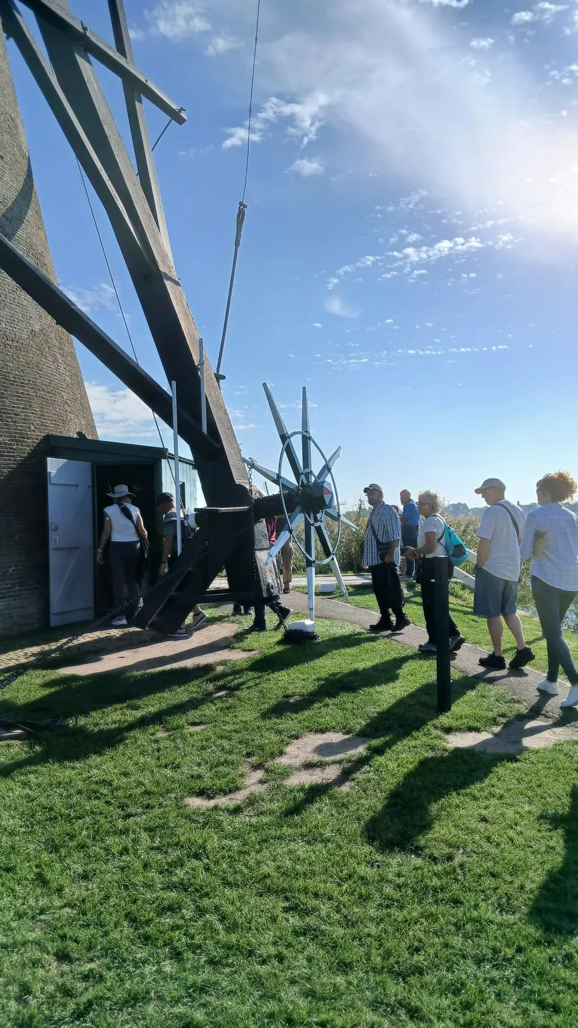 Visitors going inside a working windmill at Kinderdijk