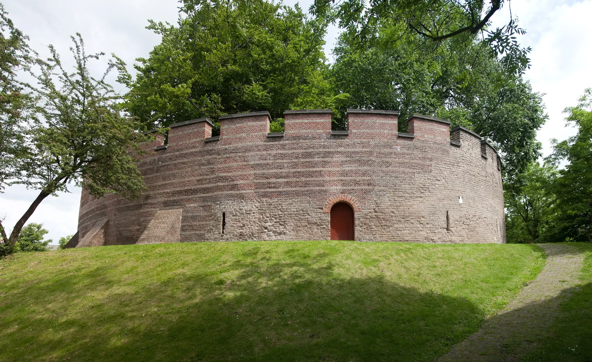The circular wall of the Burcht, Leiden's old citadel, on its grass mound