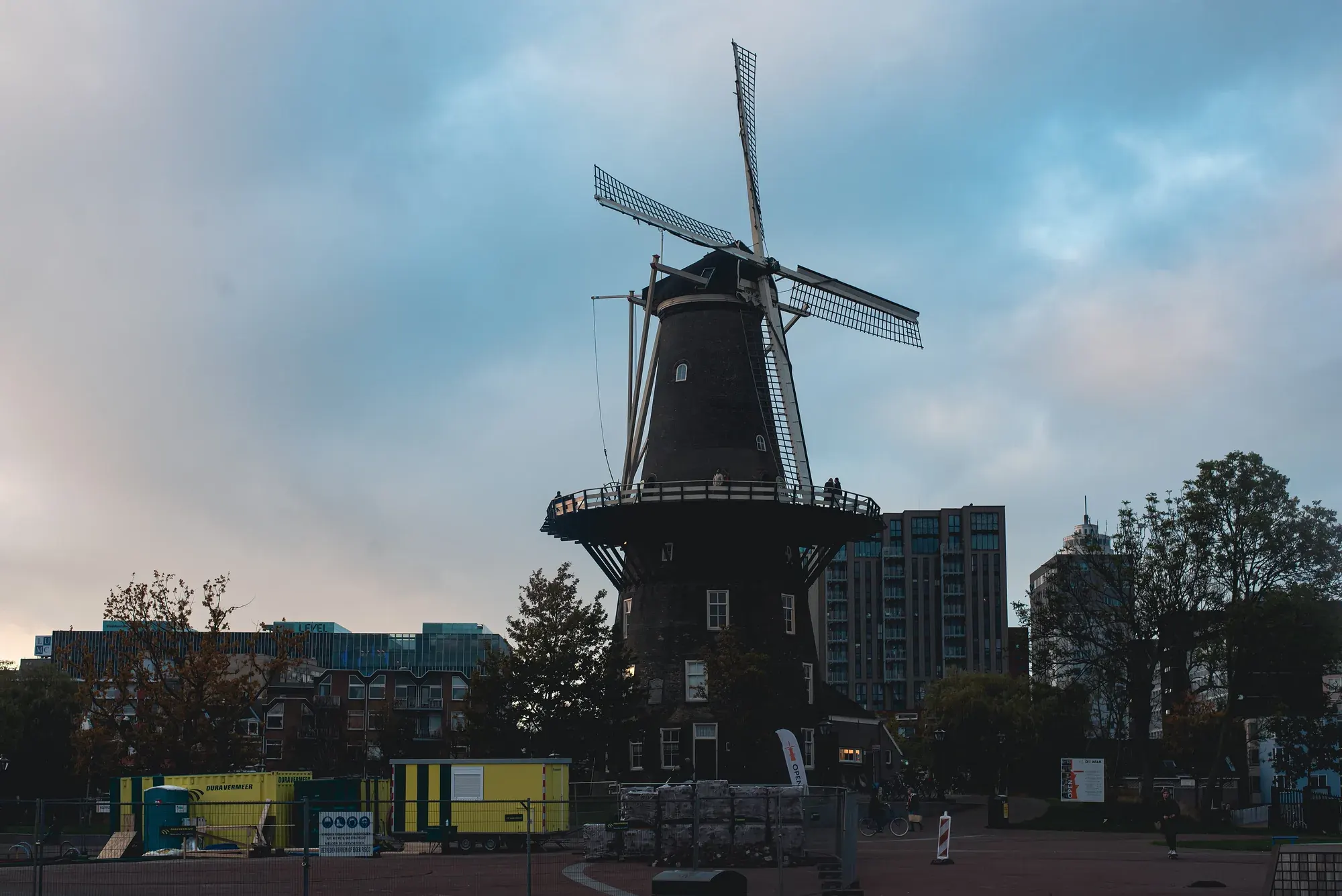 The tower windmill Molen de Valk in Leiden at dusk