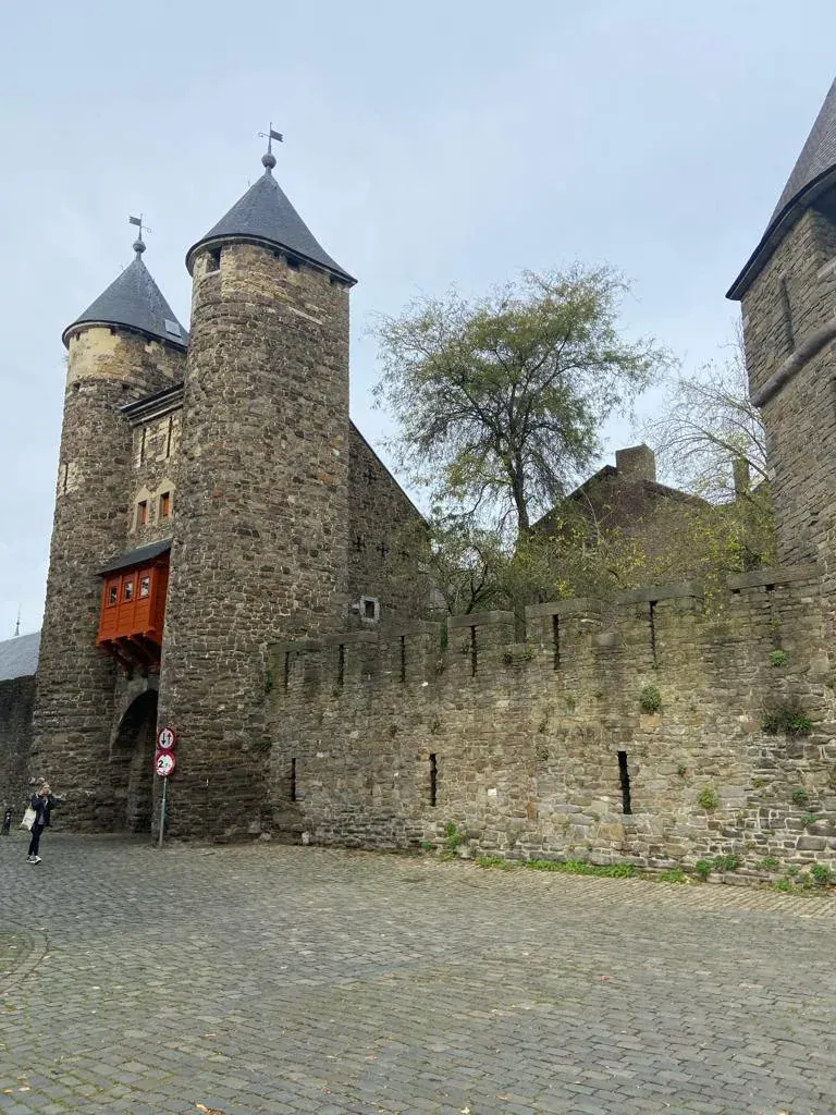 The twin-towered Helpoort gate and the medieval city wall, Maastricht