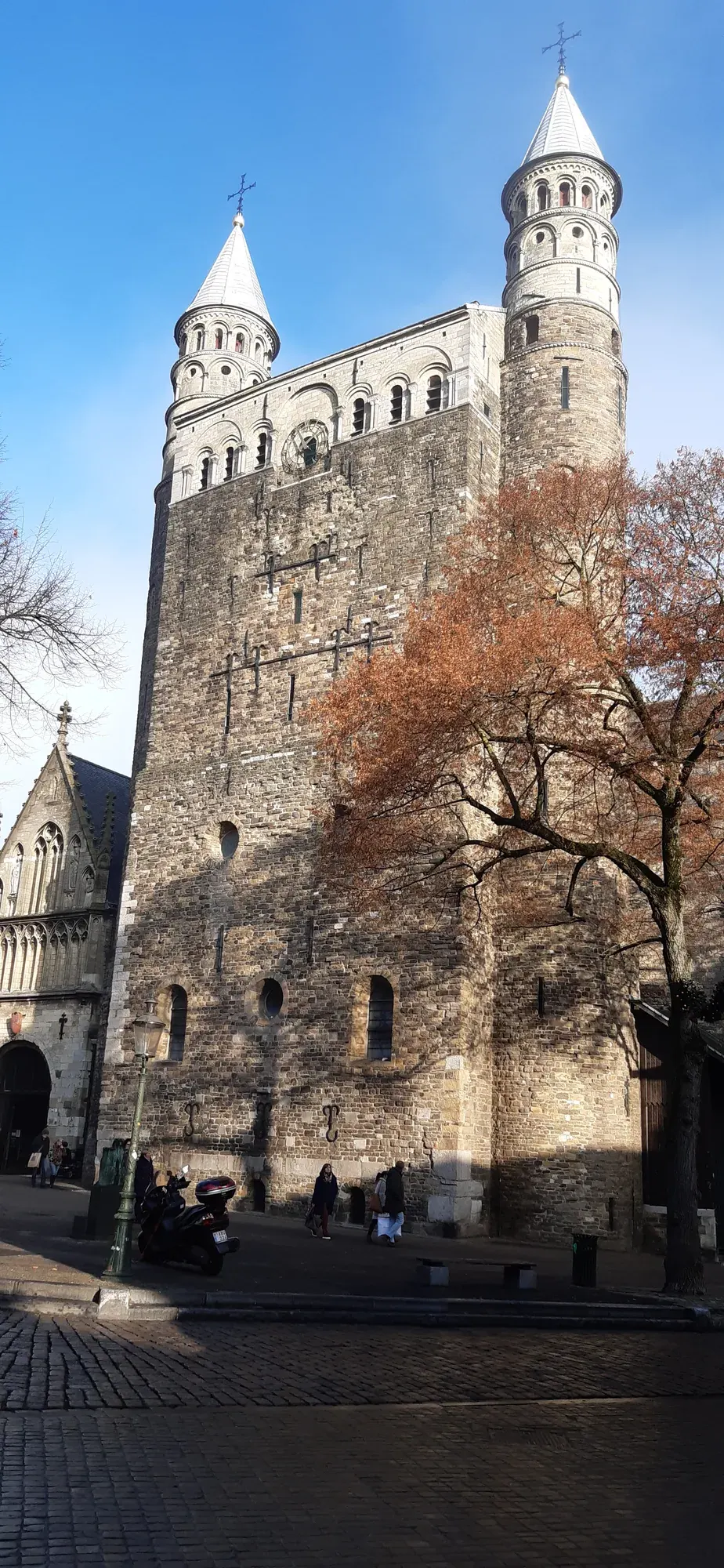 The tall stone west-work of the Onze-Lieve-Vrouwebasiliek with its two turrets, Maastricht