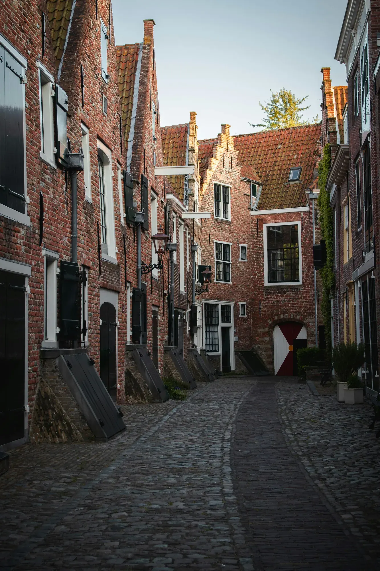 Cobbled lane between 17th-century brick houses in Middelburg