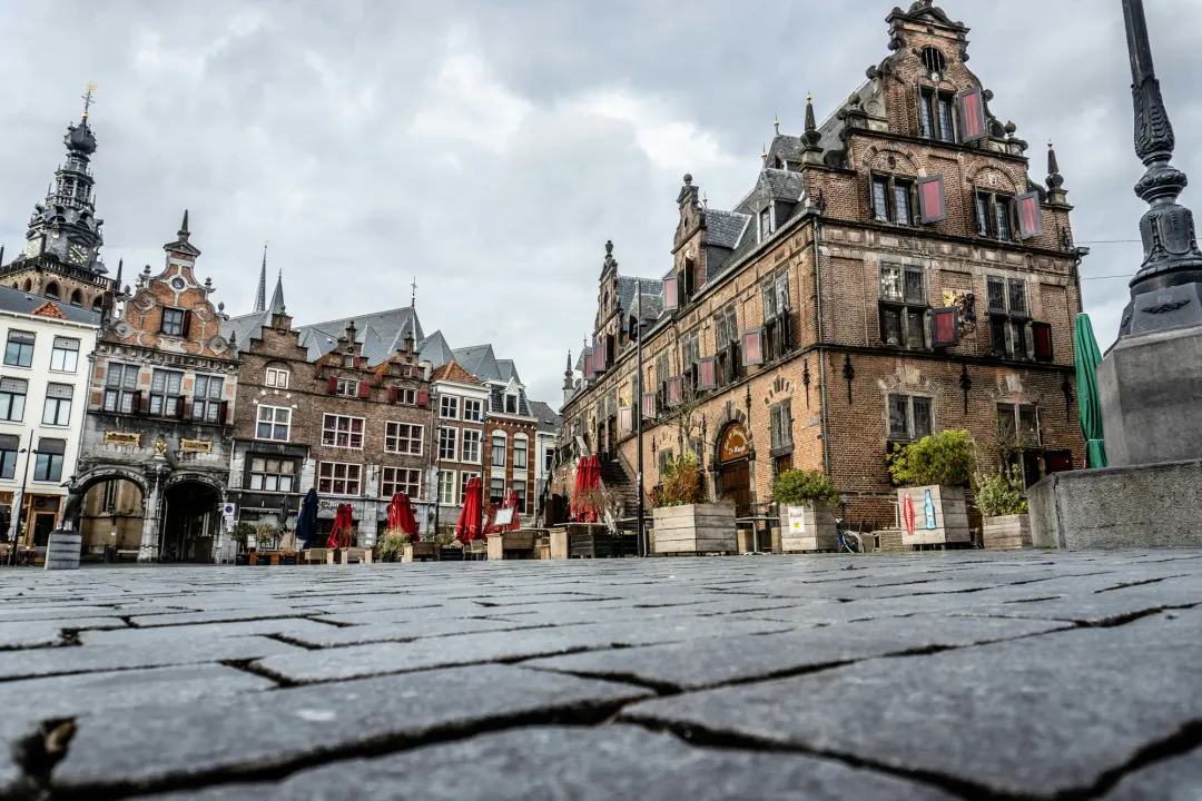The Grote Markt in Nijmegen, with the 1612 weigh house De Waagh and the Kerkboog arch