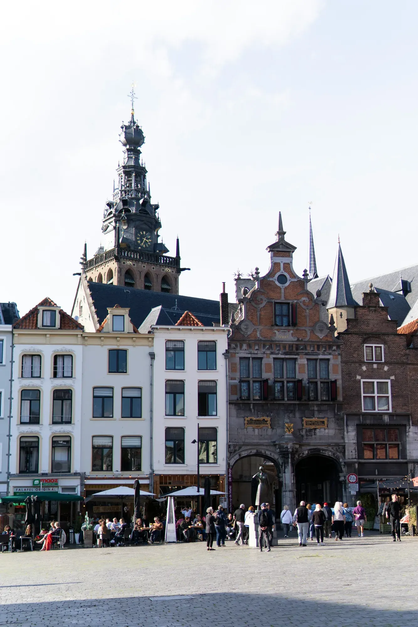 The Kerkboog arch on the Grote Markt in Nijmegen with the Stevenskerk tower behind it
