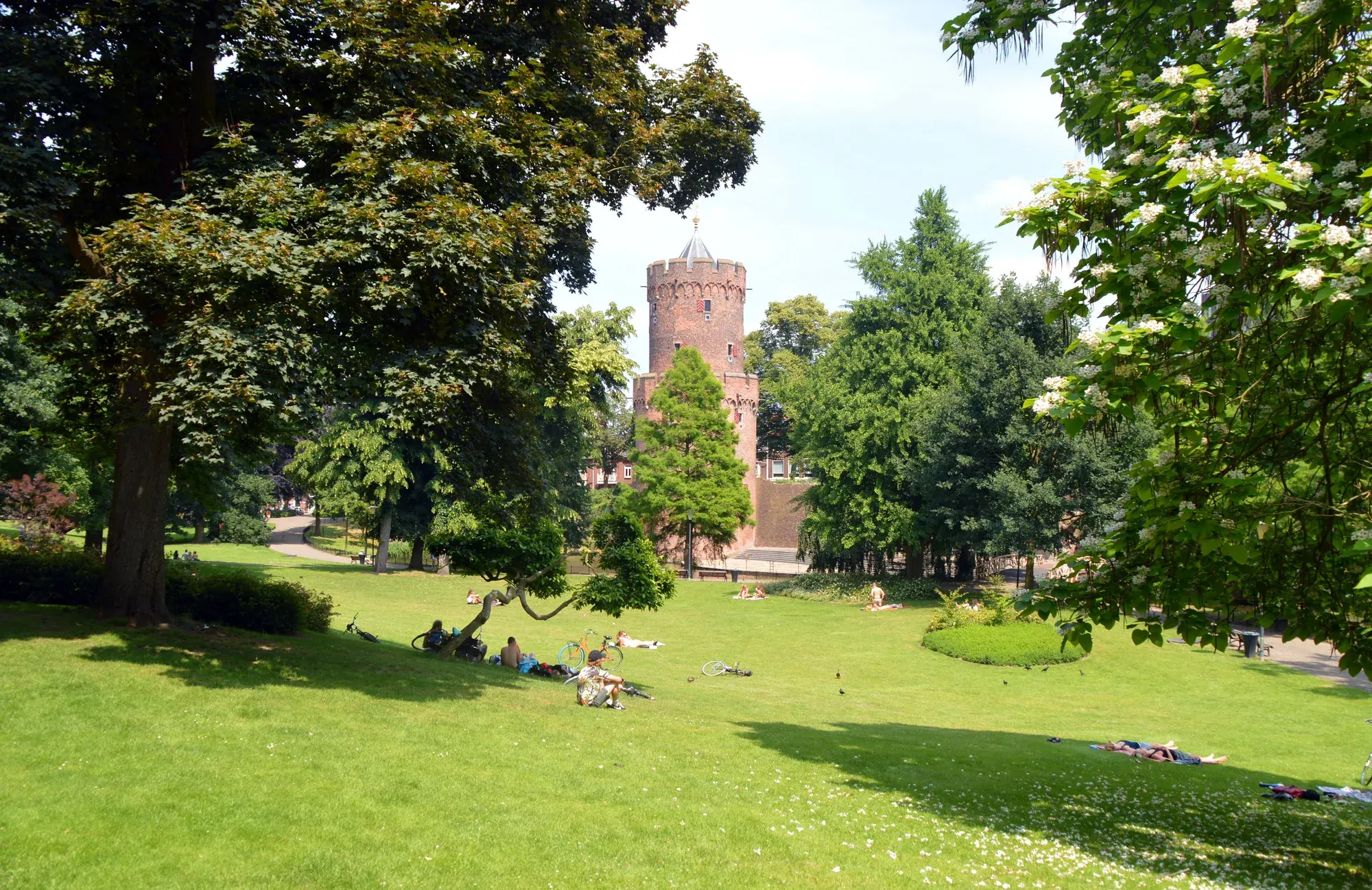 The medieval tower in the Kronenburgerpark in Nijmegen, seen across the grass