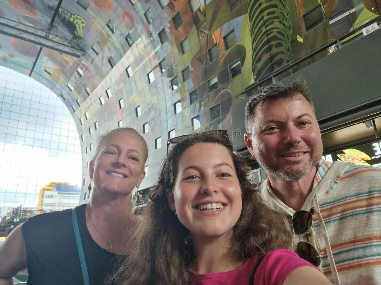 The colourful fruit-and-vegetable ceiling mural inside Rotterdam's Markthal food hall
