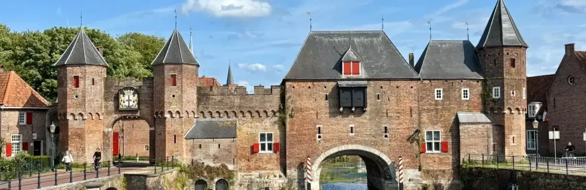 The Koppelpoort water gate in Amersfoort seen across the river