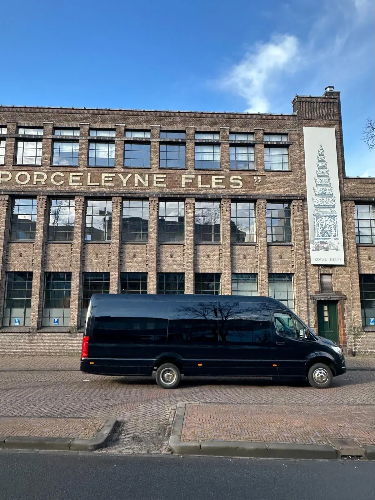 The minivan outside the Royal Delft factory