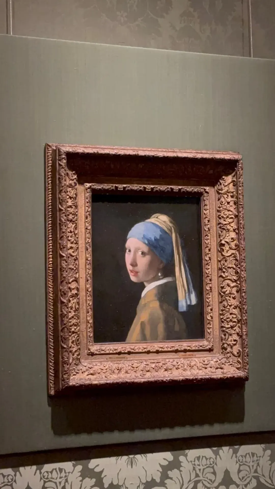 Johannes Vermeer's Girl with a Pearl Earring, around 1665, in the Mauritshuis, The Hague