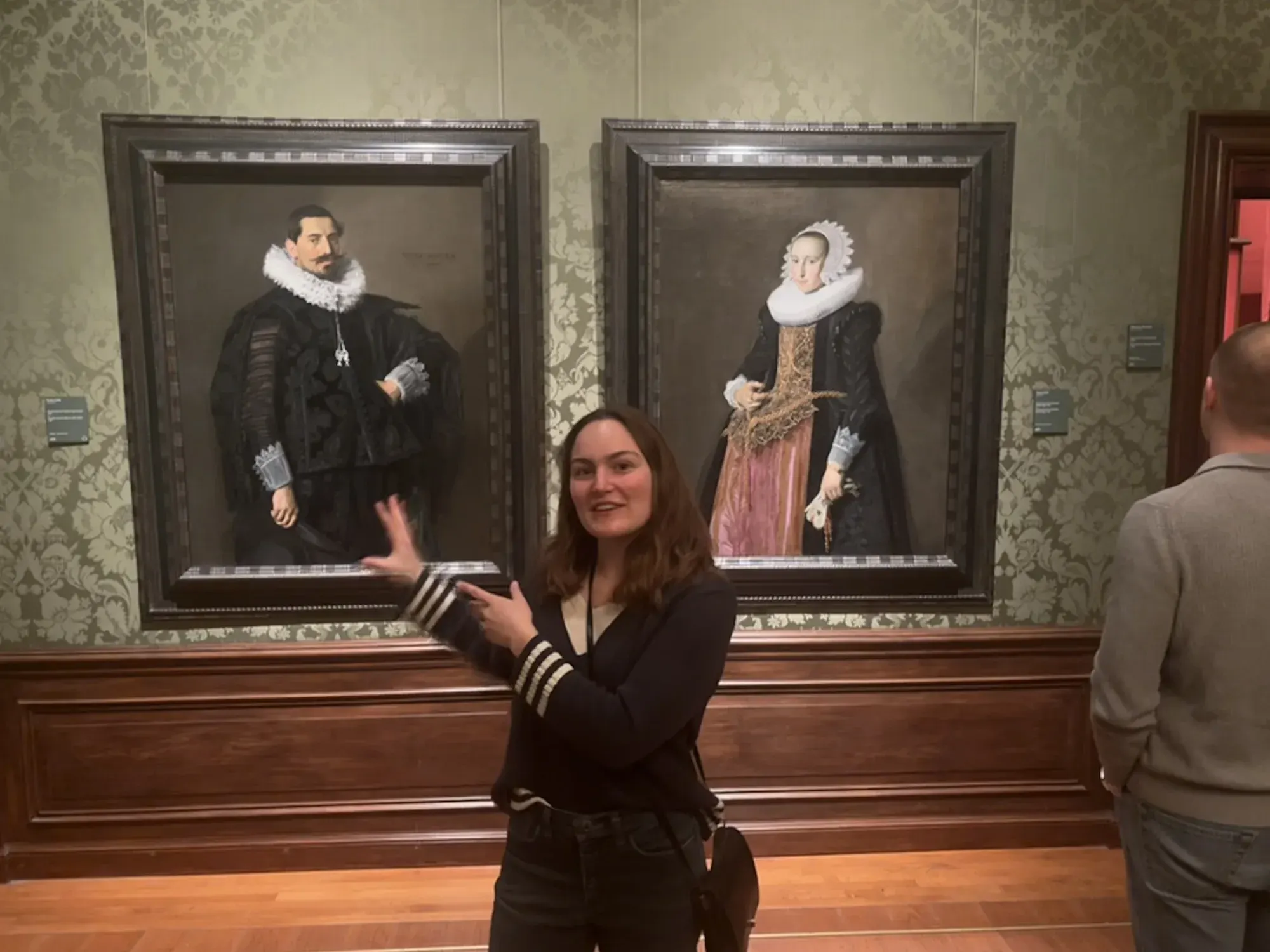 Two portraits by Frans Hals on a gallery wall in the Mauritshuis, The Hague