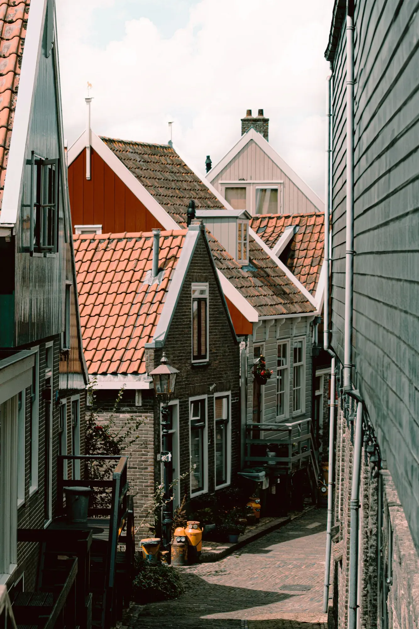 Narrow lane between old timber houses in Volendam