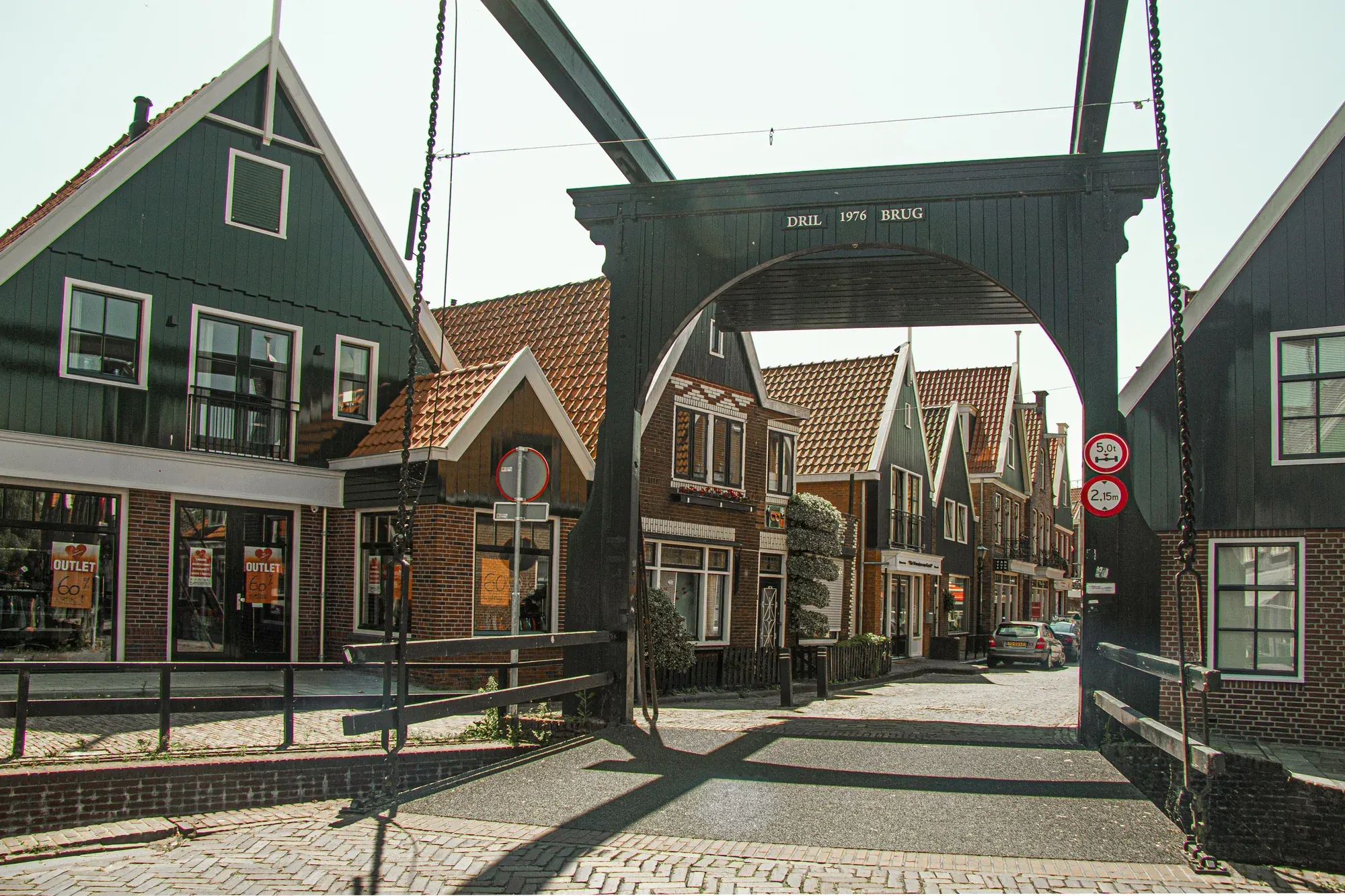 Wooden drawbridge over the canal in the old centre of Volendam