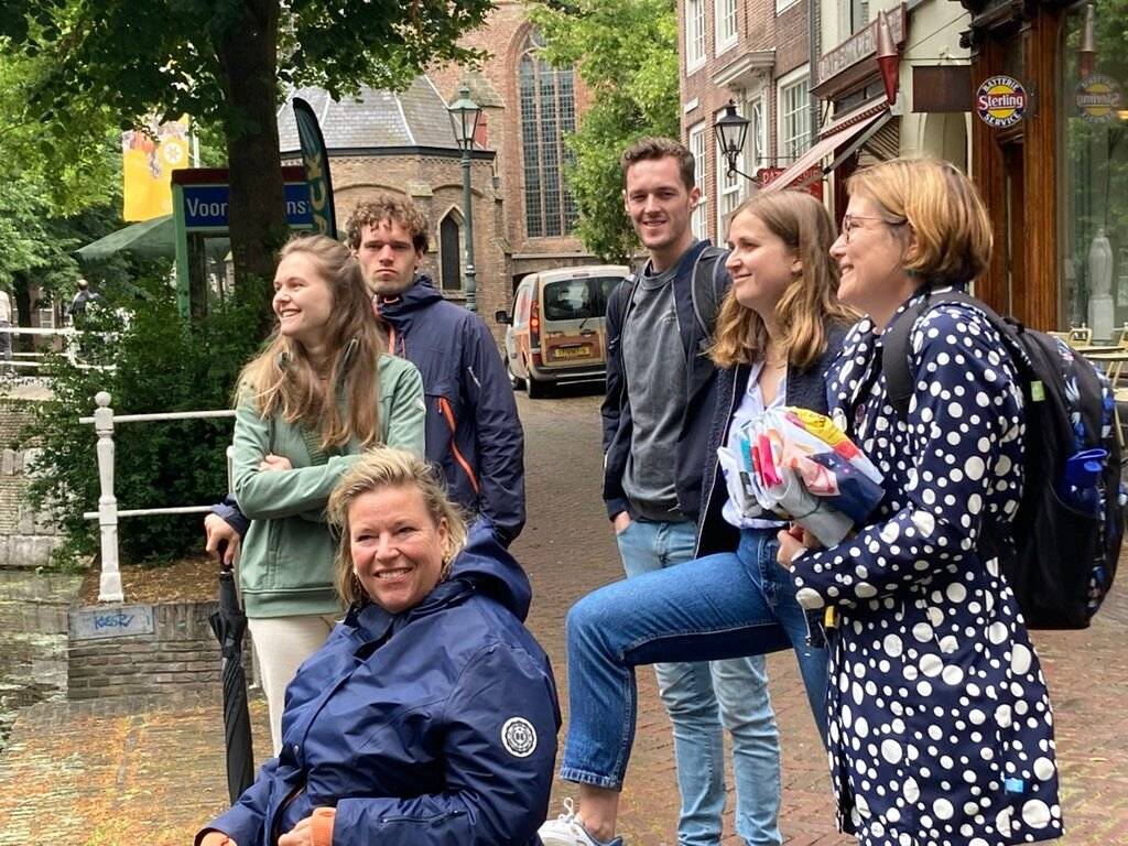 Guide and group in Delft