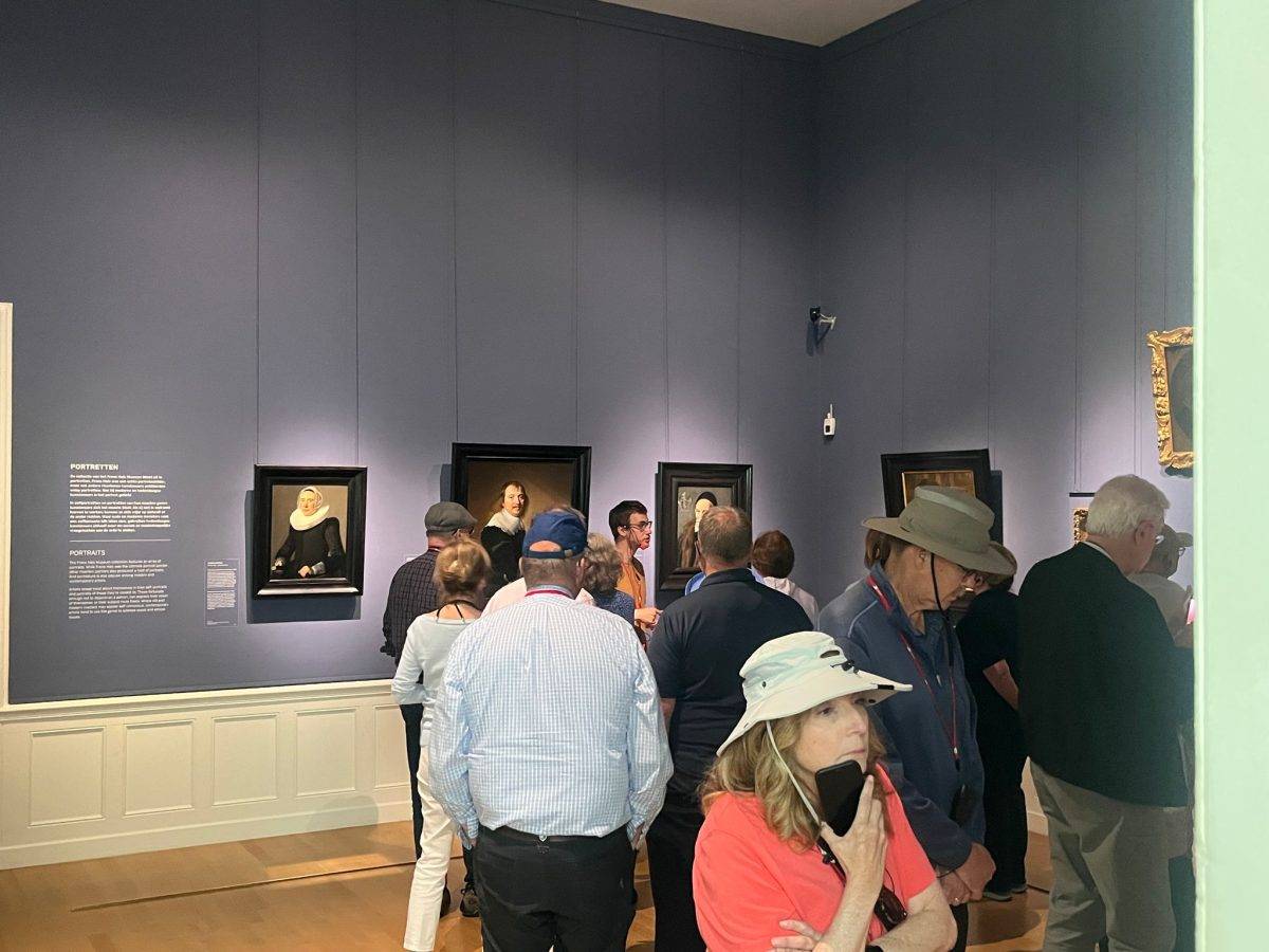 Guide and group during private tour of museum